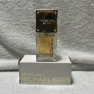 Sexy Amber by Michael Kors 1 oz. Never been used.